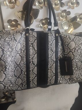 Steve Madden Black & White Snake-Print Travel Bag